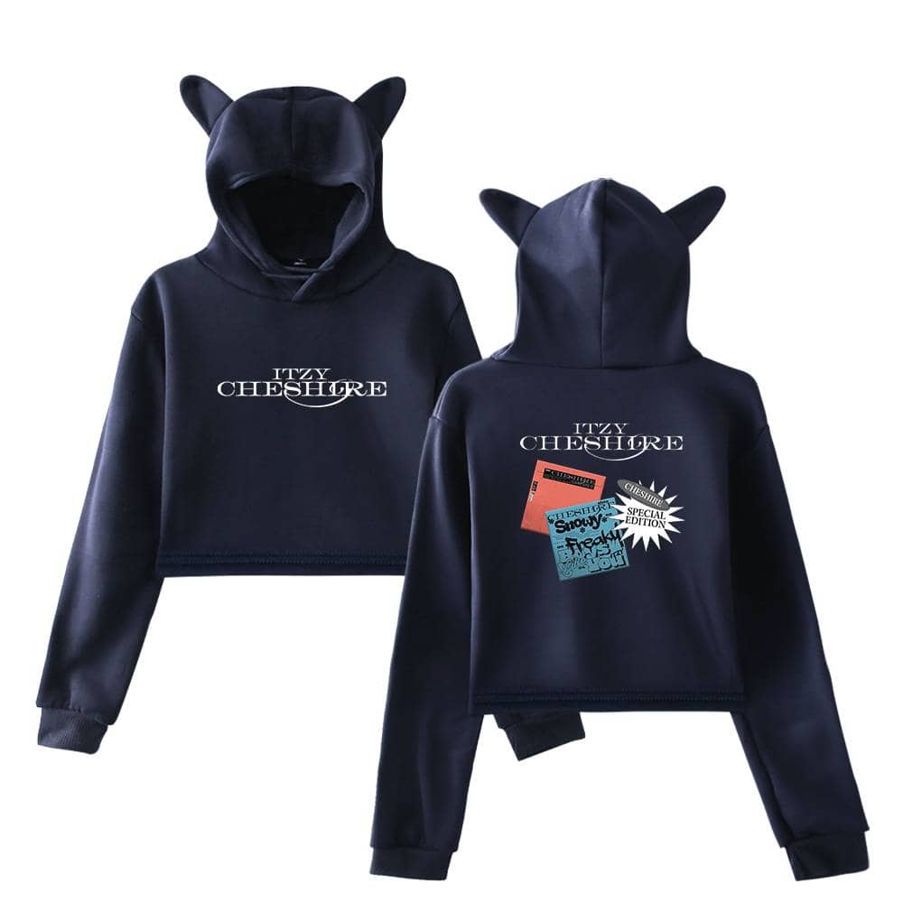 Black hooded sweatshirt with "ITZY CHESHIRE" printed in white, featuring playful graphics and cute animal ears on the hood. The back showcases colorful patches and a "Special Edition" label, adding a trendy and fun touch.