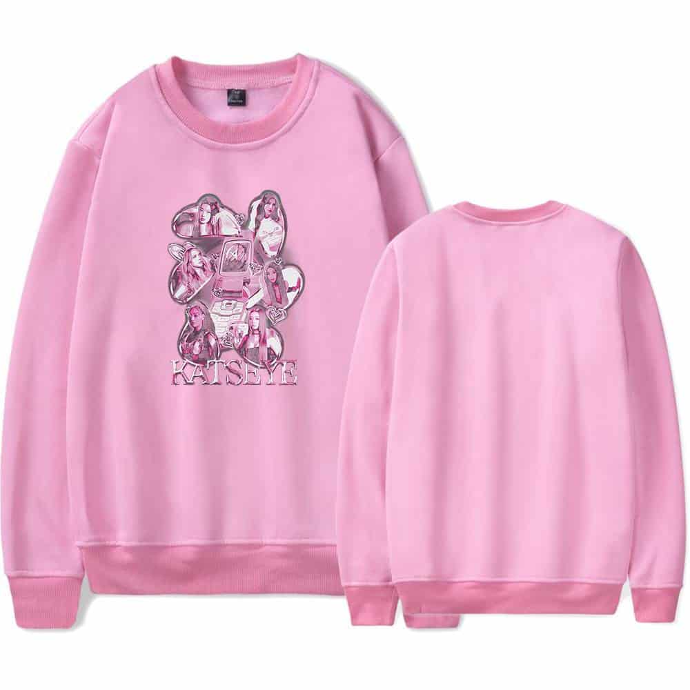 Kaitlyn Bieber swag merch pink sweatshirt with illustrated images of the singer and her name. Perfect for fans wanting to showcase their love for Justin Bieber's style and music.