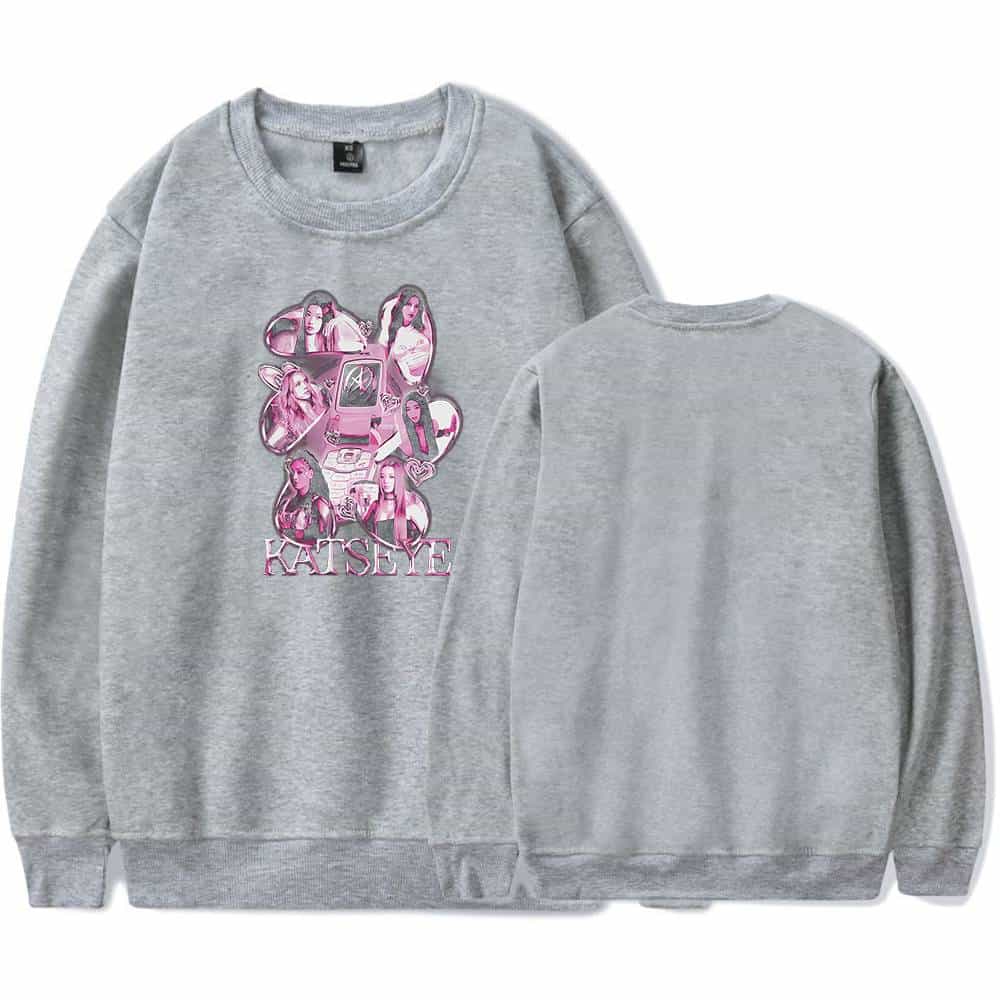 Katy Perry swag merchandise sweatshirt featuring her iconic images and logo in pink tones. Perfect for fans of pop star Katy Perry wanting stylish, comfortable apparel with a bold statement.