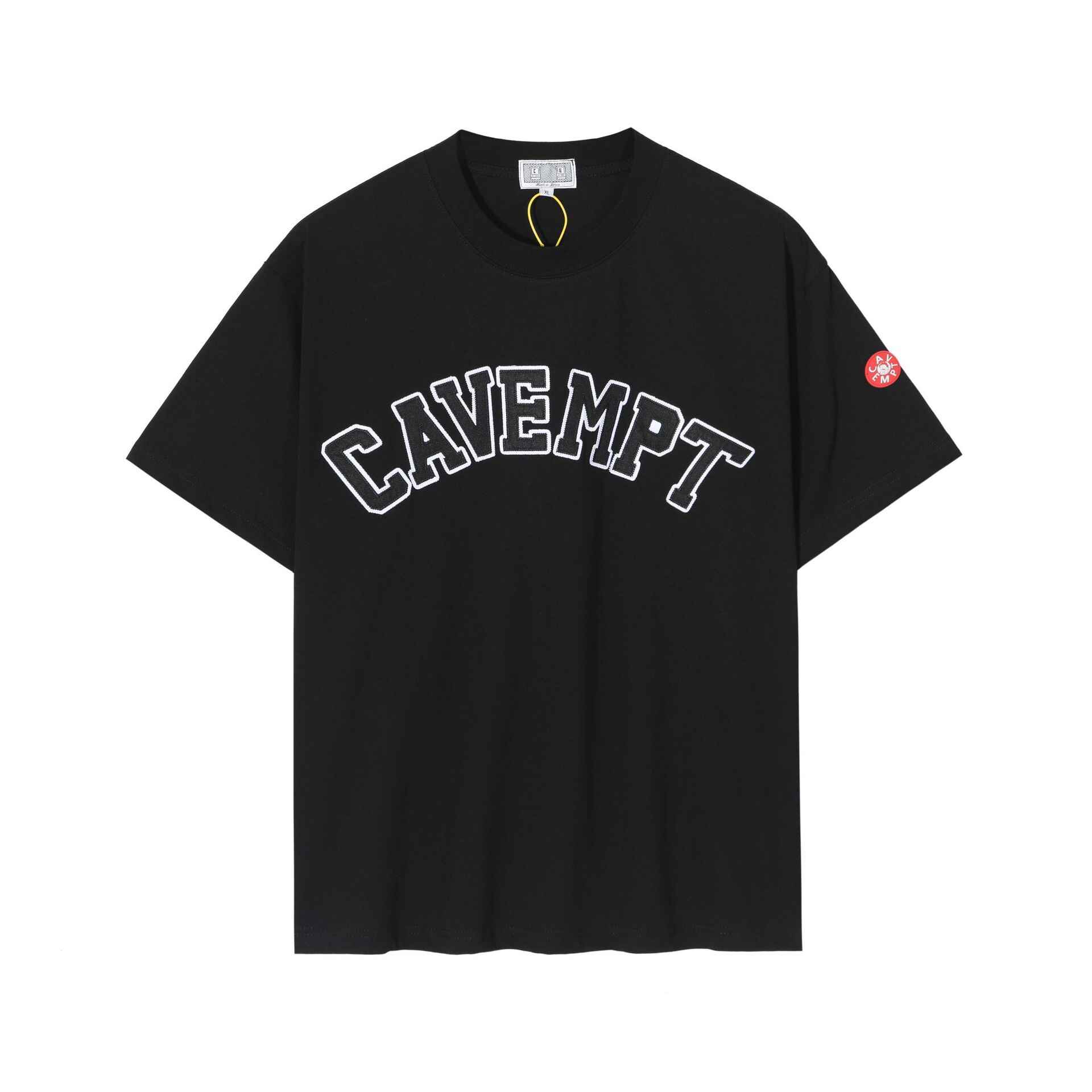 Black CAVEMPT graphic t-shirt featuring bold white embroidery. Justin Bieber swag merch casual streetwear style. Perfect for fans of trendy hip-hop and pop fashion. High-quality, comfortable fit.