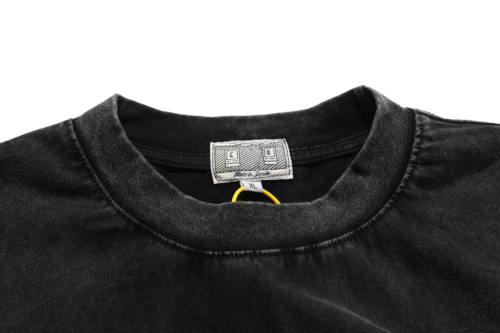Plain black Justin Bieber swag t-shirt with graphic design elements, casual streetwear style, made in Japan, size XL.