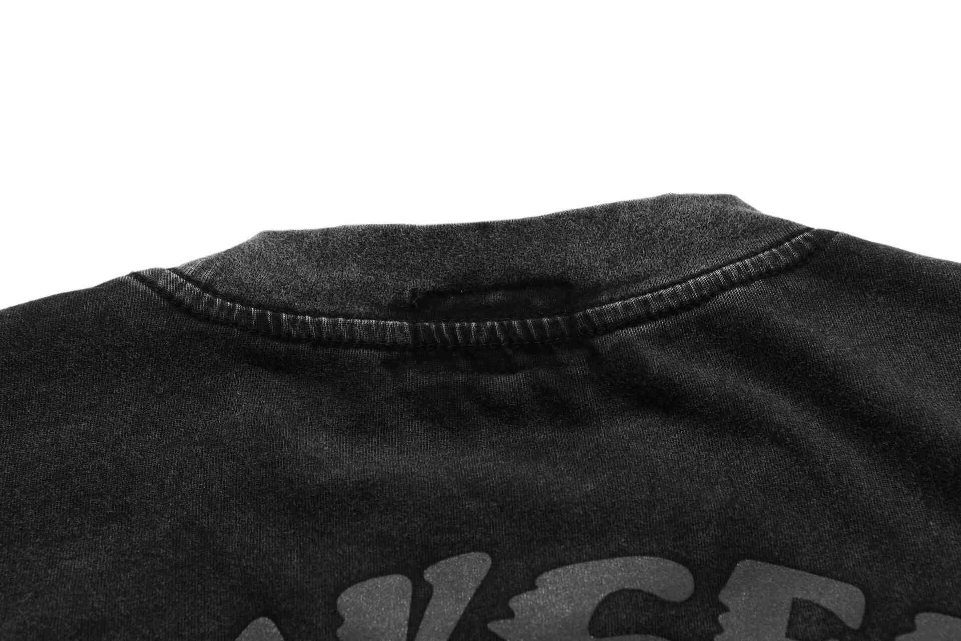 Promotional Justin Bieber swag merchandise, featuring stylish black t-shirts with graphic logos for fans and fashion enthusiasts.