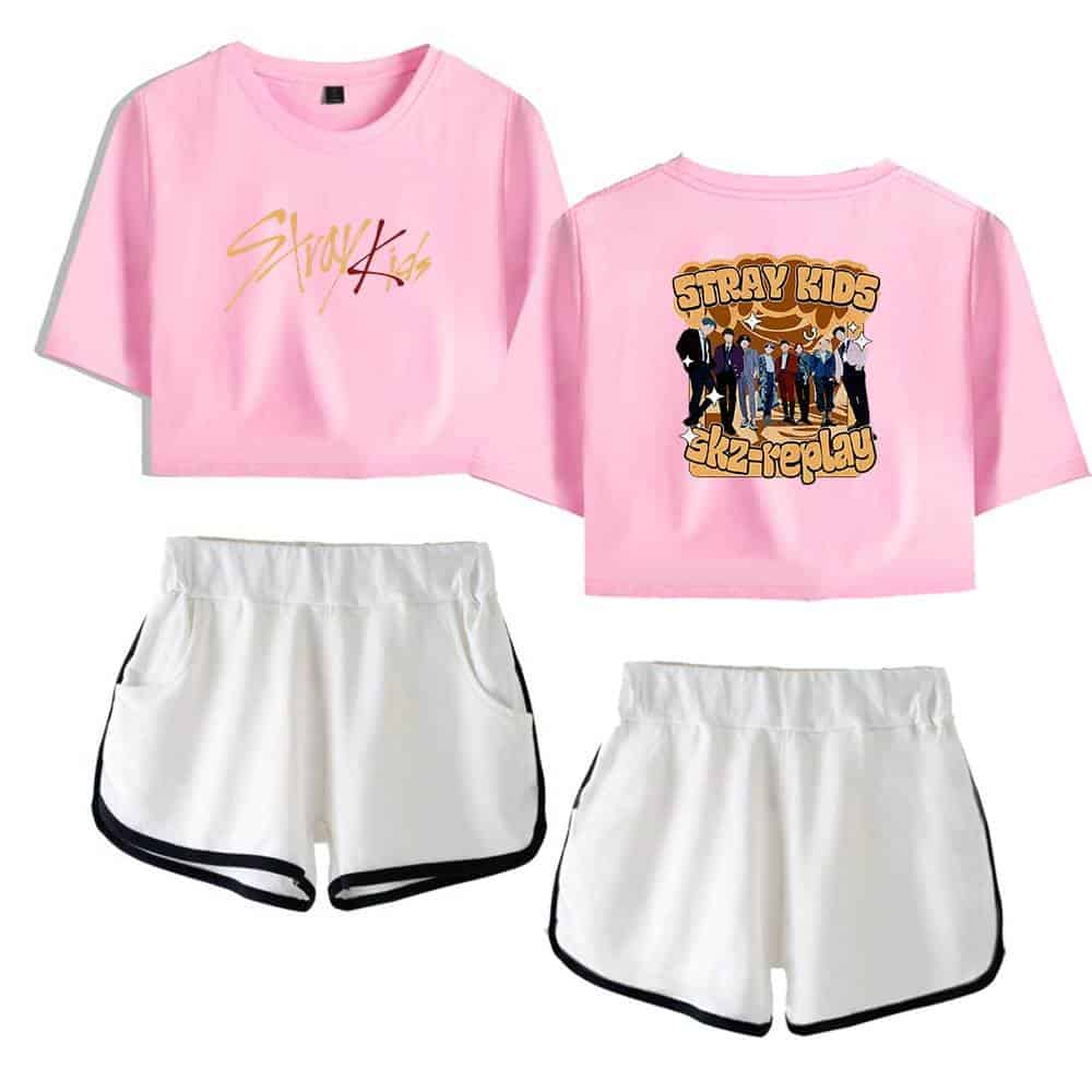 Stray Kids swag merch pink cropped t-shirt and white shorts with black trim, perfect for fans. Features the group's logo on the front and a colorful graphic on the back for a trendy, casual look.