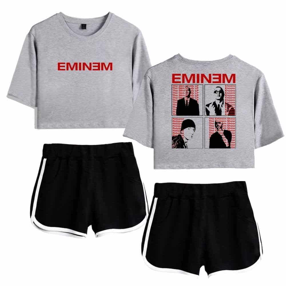 EmineM cropped sweatshirt with red logo and graphic design, paired with black athletic shorts with white trim, inspired by Justin Bieber swag merchandise.