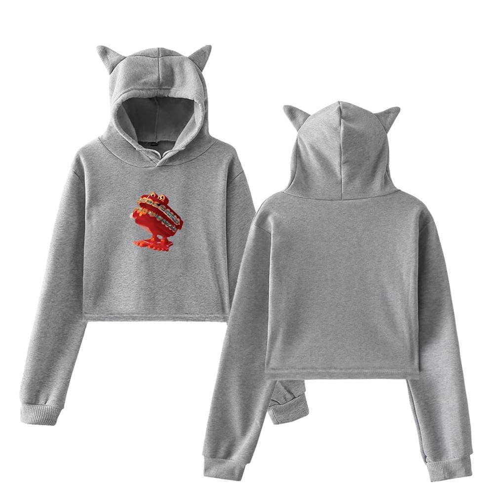 Justin Bieber swag hoodie set with a cartoon dinosaur graphic, featuring cat ears on the hood, perfect for fans of fashion-forward streetwear and artist-inspired merchandise.