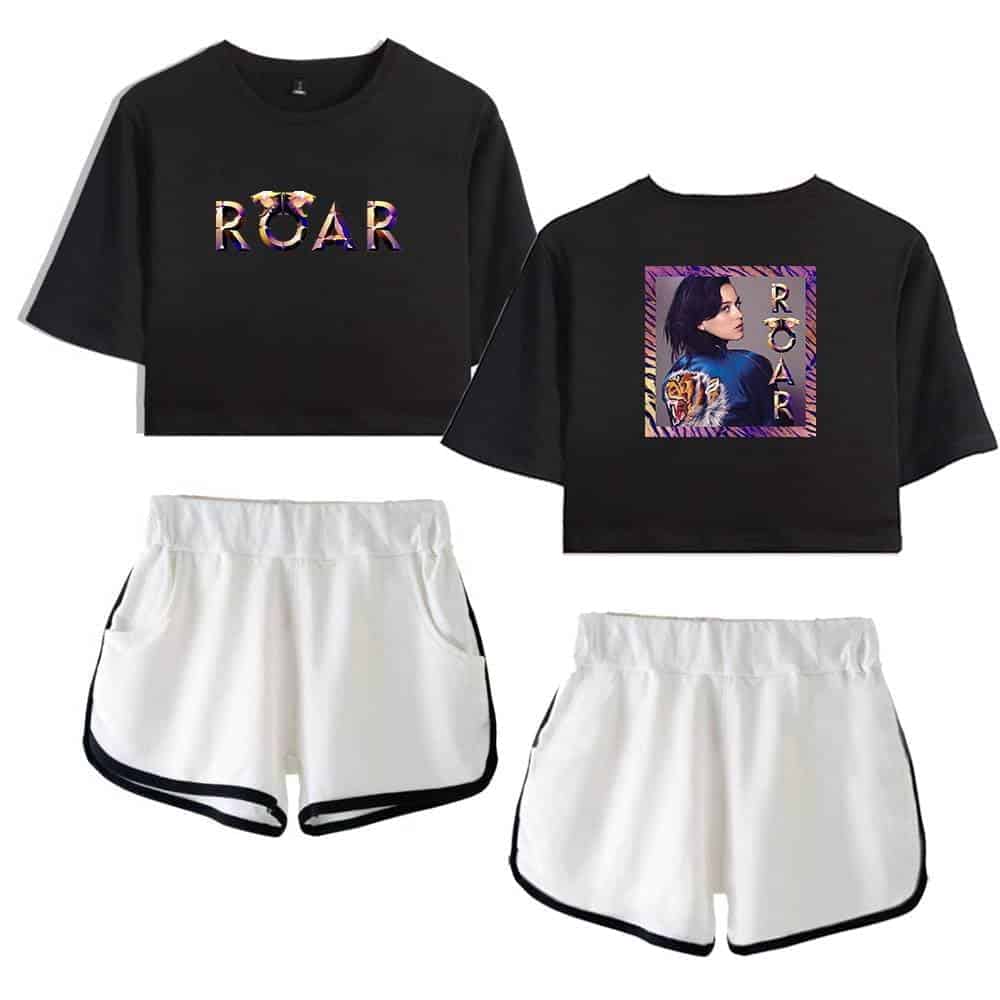 ROAR black crop top with colorful lettering, featuring a graphic back design of a woman and a tiger, paired with white athletic shorts with black trim.