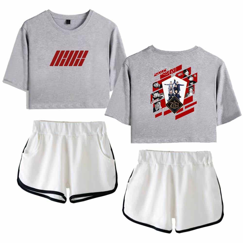 Worn by Justin Bieber, this swag merch set features a stylish grey cropped T-shirt with bold red graphic print, pairing perfectly with sporty white shorts with black trim. A trendy, casual look for fans.