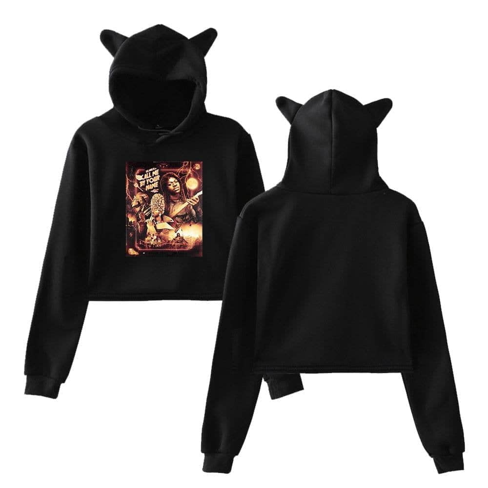 Justin Bieber swag merch hoodie with playful animal ears on the hood, featuring a graphic design of a woman with a neon background, perfect for fans of celebrity-inspired streetwear.