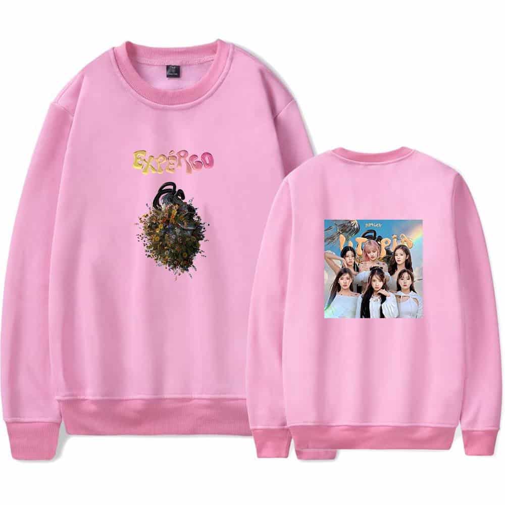 Pink Justin Bieber swag hoodie with graphic design and printed photo of a girl group, trendy streetwear for fans, stylish and comfortable merchandise for fans of Justin Bieber and pop groups.