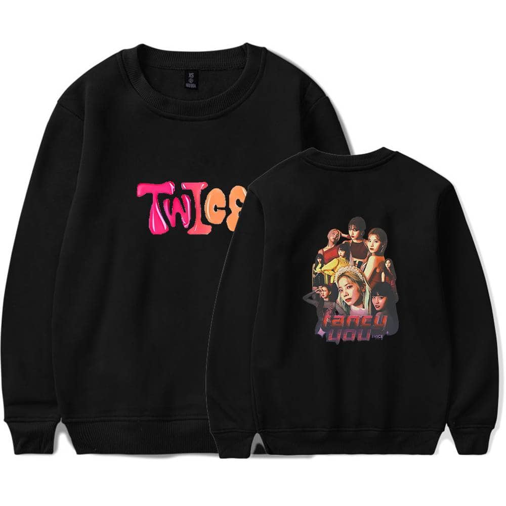 Bright pink and orange "TWICE" logo sweatshirt with a colorful group photo of TWICE members on the back, perfect Justin Bieber swag merch.