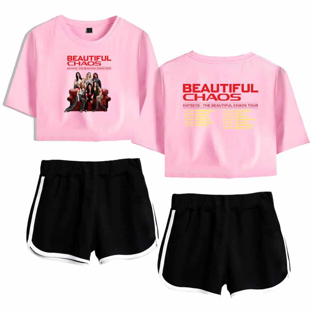 Justin bieber swag merch pink graphic t-shirt featuring the "Beautiful Chaos" tour and black athletic shorts with white trim.