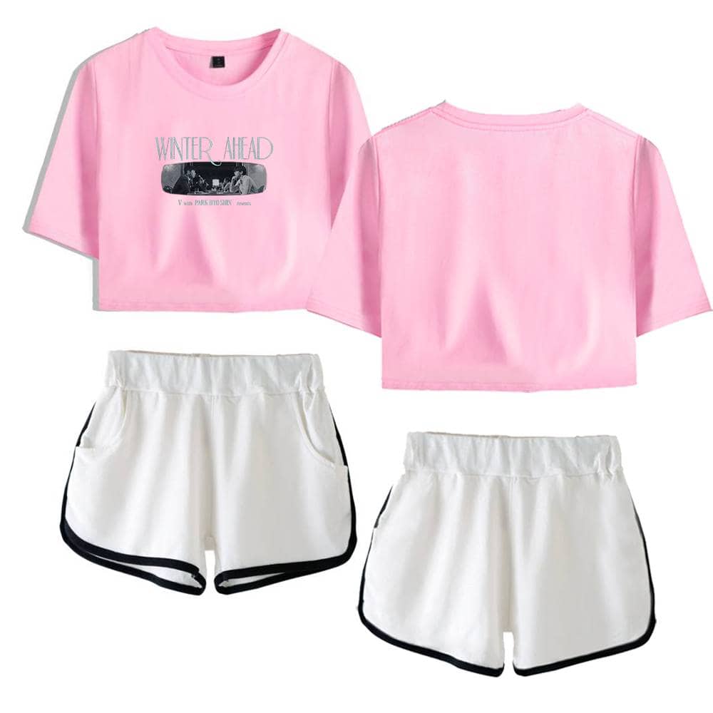 Pink cropped t-shirt with "Winter Ahead" text and black-and-white graphic.