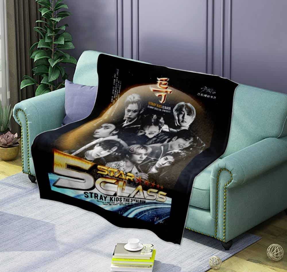 Justin Bieber swag merch throw blanket featuring K-pop group Stray Kids, with iconic album art and bold graphics for fans of both artists.