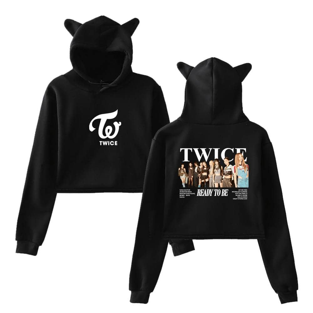 Black hoodie featuring the TWICE logo with playful cat ear details on the hood, perfect for K-pop fans and streetwear style.