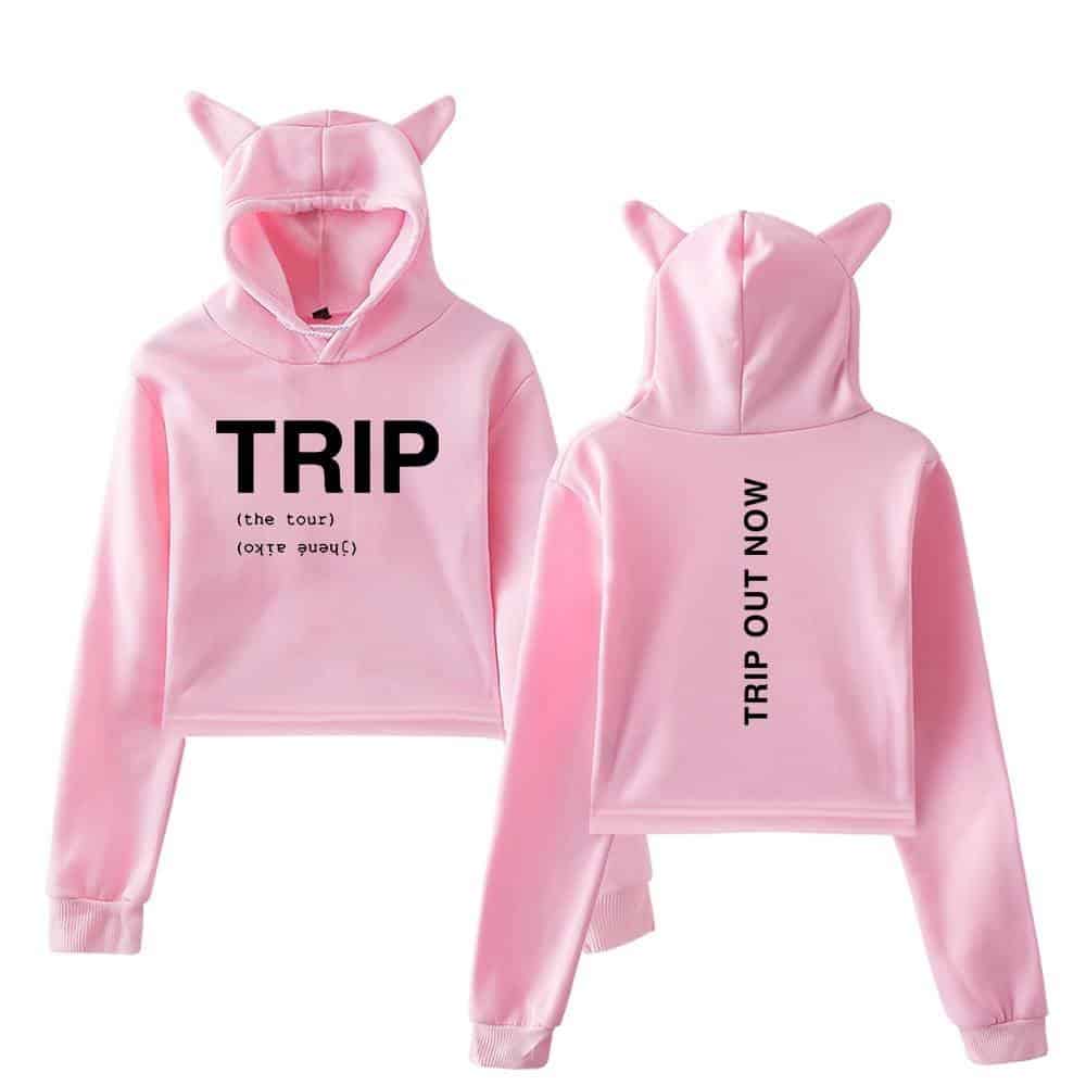 Pink hoodie set featuring a hood with cat ear details, printed with "TRIP" and "TRIP OUT NOW" text, inspired by Justin Bieber swag merch, combining playful style with streetwear fashion.