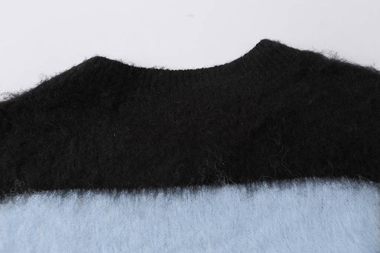 Black fuzzy sweater featuring a casual and trendy Justin Bieber swag merch style. Perfect for fans looking to showcase their admiration with fashionable apparel.