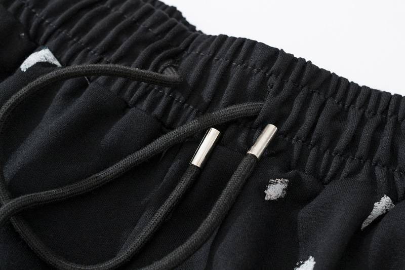 Black sweatpants with "Justin Bieber swag merch" print, featuring a drawstring waist and casual style. Perfect for fans wanting to showcase their love for Bieber's merchandise.