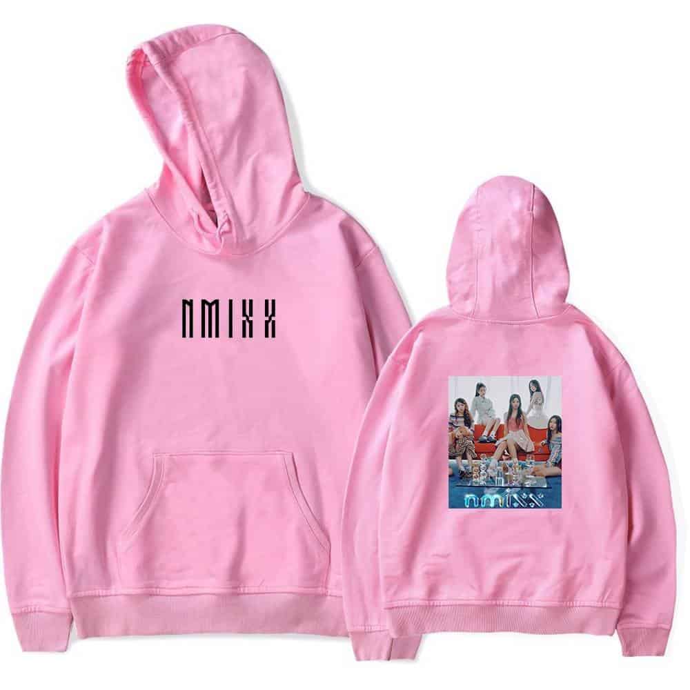 NMKX pink hoodie with graphic of the K-pop girl group TWICE on the back, featuring vibrant colors and trendy streetwear style.