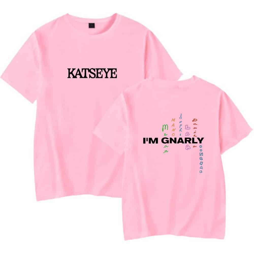 KATSEYE pink graphic t-shirt featuring bold black text, casual style, and vibrant multicolored design elements, perfect for fans of Justin Bieber swag merch.