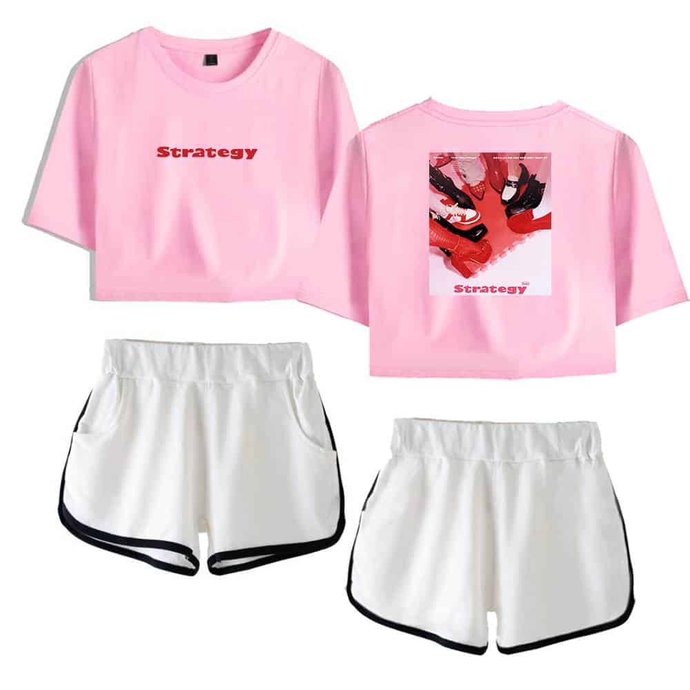Pink cropped t-shirt with "Strategy" text and graphic design, paired with white athletic shorts with black trim, inspired by Justin Bieber swag merch.