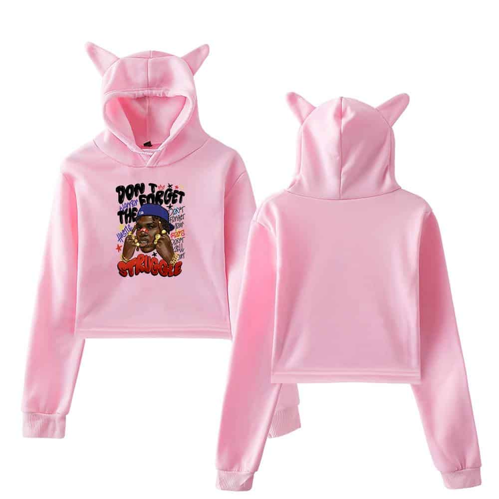 Don’t forget the struggle graphic hoodie featuring a cartoon-style illustration of a woman, with pink color and playful design elements. Perfect for fans of Justin Bieber swag merchandise.