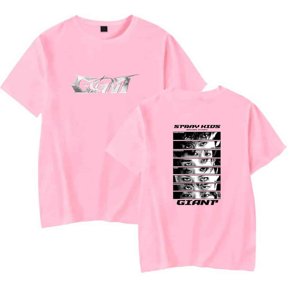 Giant logo and Stray Kids face graphic pink T-shirt, trendy streetwear merch, Justin Bieber swag style, bold eye designs, youth fashion statement, popular music band apparel, stylish gift idea, limited edition clothing.