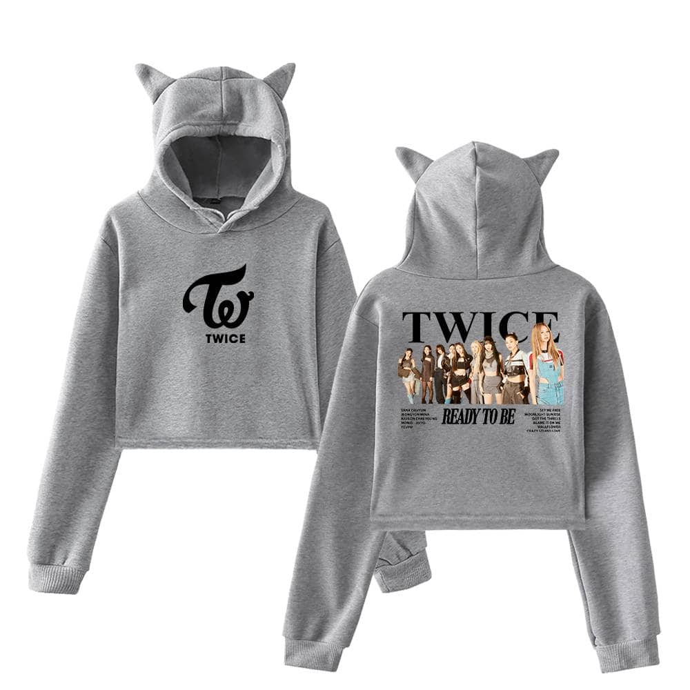 Comfortable gray hoodie and sweatpants set inspired by K-pop girl group TWICE, featuring cute cat ear design on the hood and a graphic print of the group with the text "READY TO BE" on the back.
