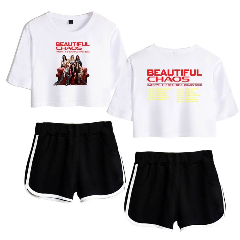Justin Bieber swag merchandise featuring a casual white cropped T-shirt with "Beautiful Chaos" text and a group photo, paired with black athletic shorts with white trim. Perfect for fans wanting trendy and stylish Justin Bieber-inspired apparel.