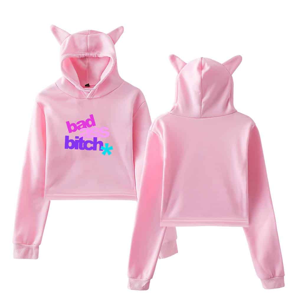 Pink hoodie with cat ears and "bad bitches" text in purple, pink, and blue, trendy Justin Bieber swag merch piece.