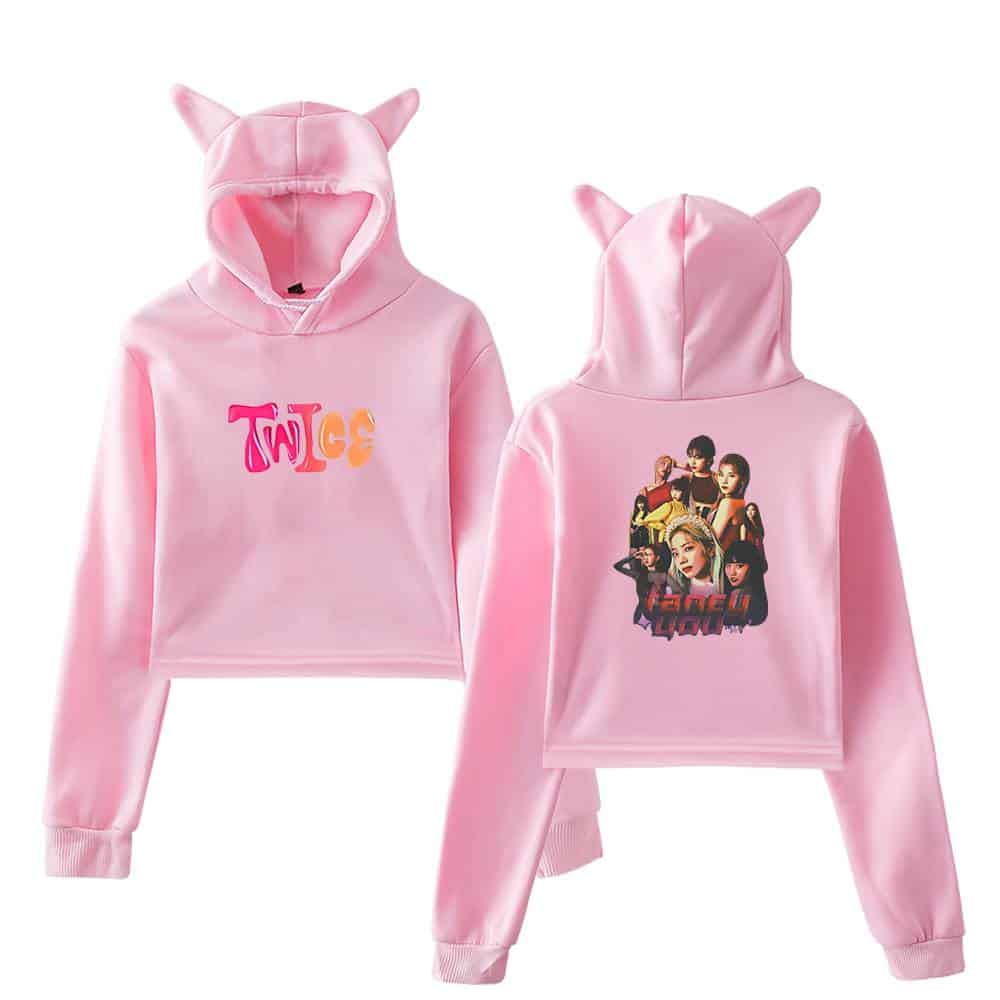 Twice swag hoodie for fans, pink hooded sweatshirt with cute ears and logo print, featuring the K-pop girl group Twice on back, perfect for stylish and cozy merchandise fans.