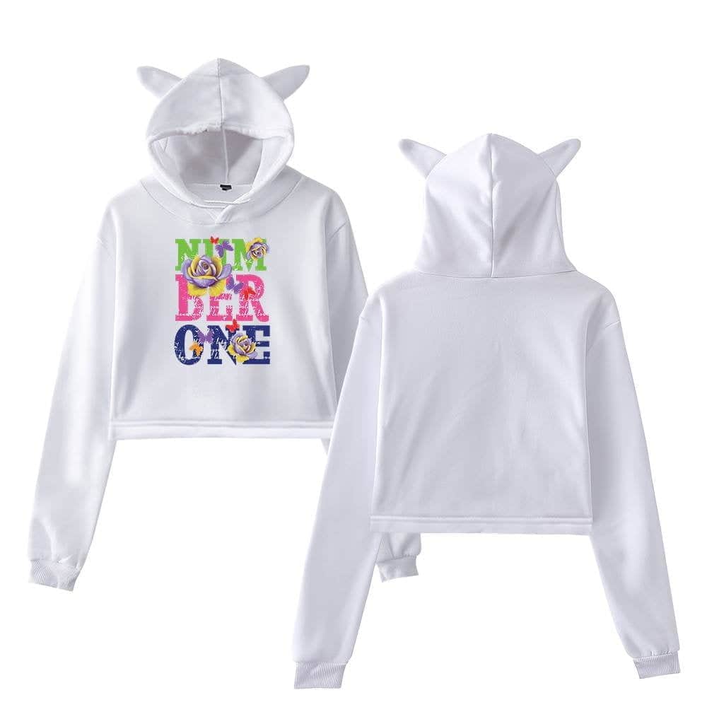 Bright white hoodie and sweatpants set with playful unicorn horns on the hood, featuring colorful "NUN UNDER ONE" graphic with roses, embodying Justin Bieber swag merch style.
