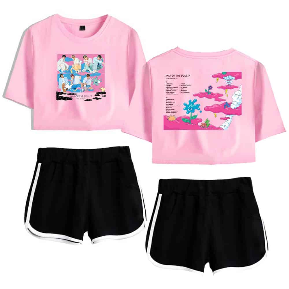 Justin Bieber swag merch featuring a trendy pink graphic T-shirt with cartoon-style artwork and black athletic shorts with white trim. Perfect for fans who want stylish, casual streetwear inspired by the pop icon.