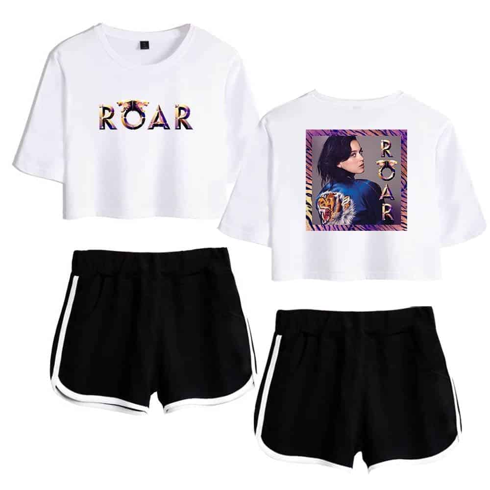 ROAR graphic crop t-shirt with colorful animal print and bold lettering, paired with sporty black shorts with white trim. Stylish Justin Bieber swag merch for fans.