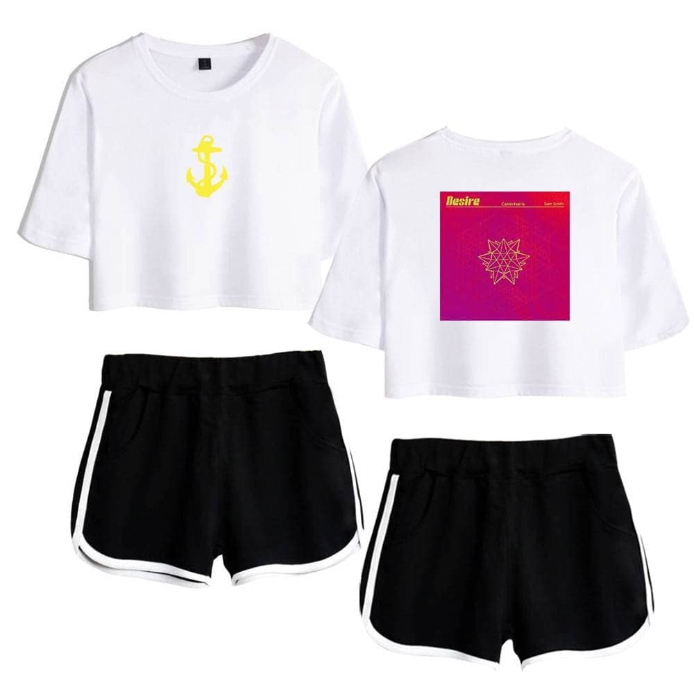 Anchor and ship graphic in yellow on the front of the white cropped T-shirt, with a vibrant pink and geometric design on the back. Black shorts with white stripe accents complete the look.