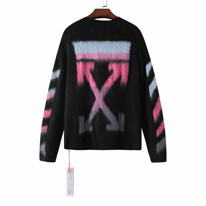 Black sweatshirt featuring pink, white, and gray graffiti-inspired Justin Bieber swag design, perfect for fans of Justin Bieber's killer merch collection.