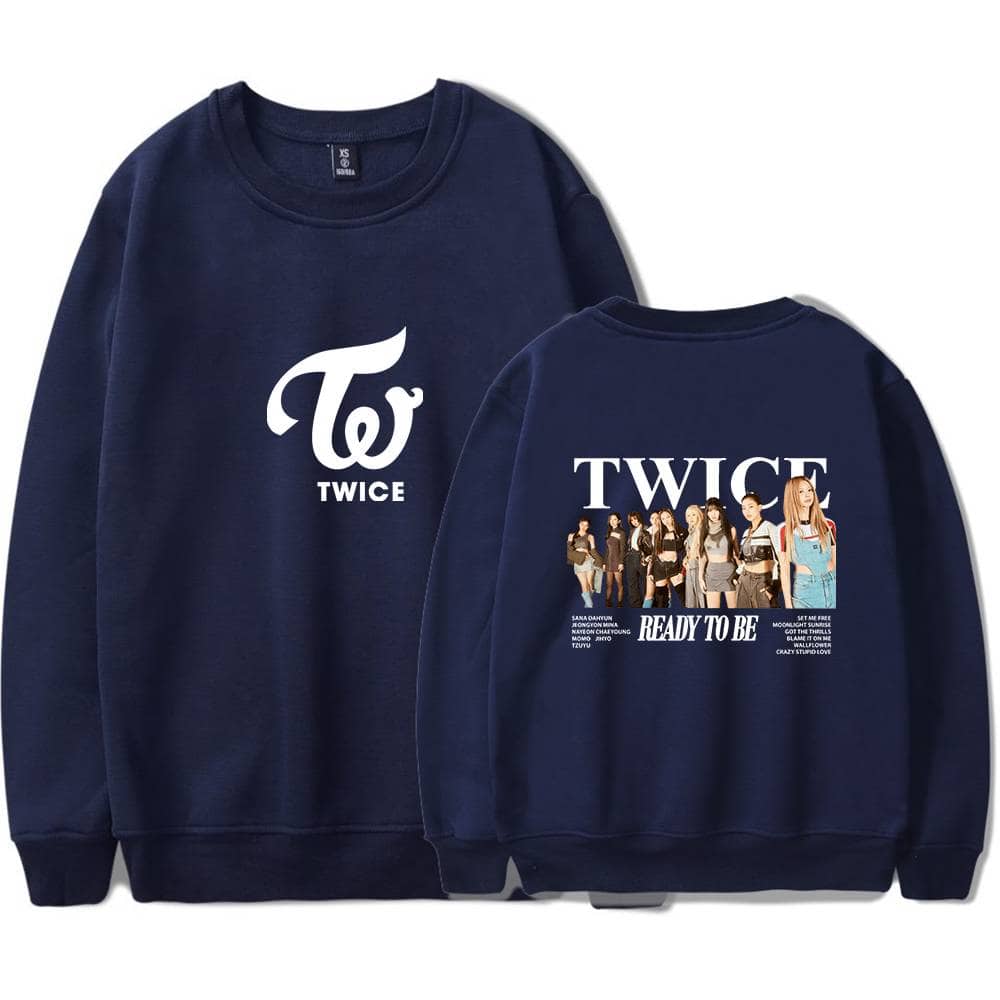 Vintage TWICE hoodie sweatshirt featuring the group's logo and a photo of the members, perfect for K-pop fans and Justin Bieber swag merch collectors.