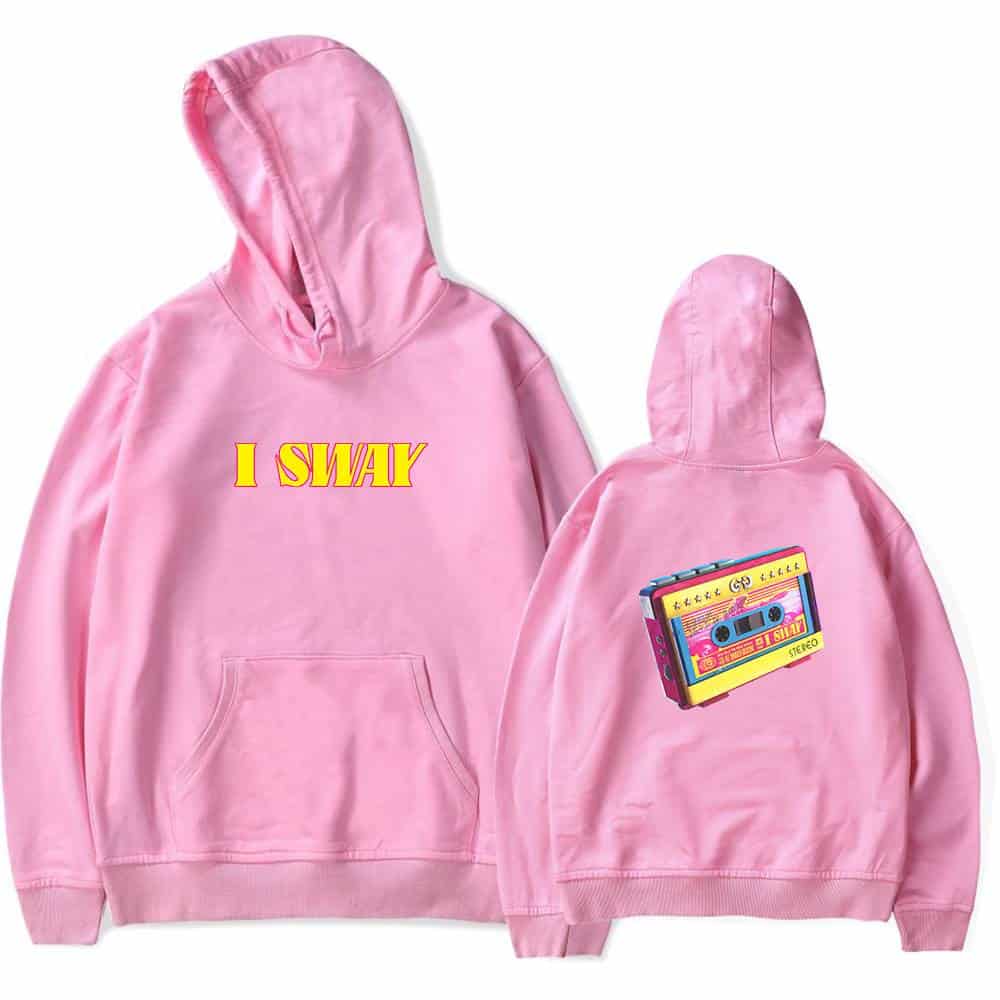 Bright pink hoodie featuring bold "I SWAY" text on the front and a colorful retro cassette tape graphic on the back, inspired by Justin Bieber swag merchandise.