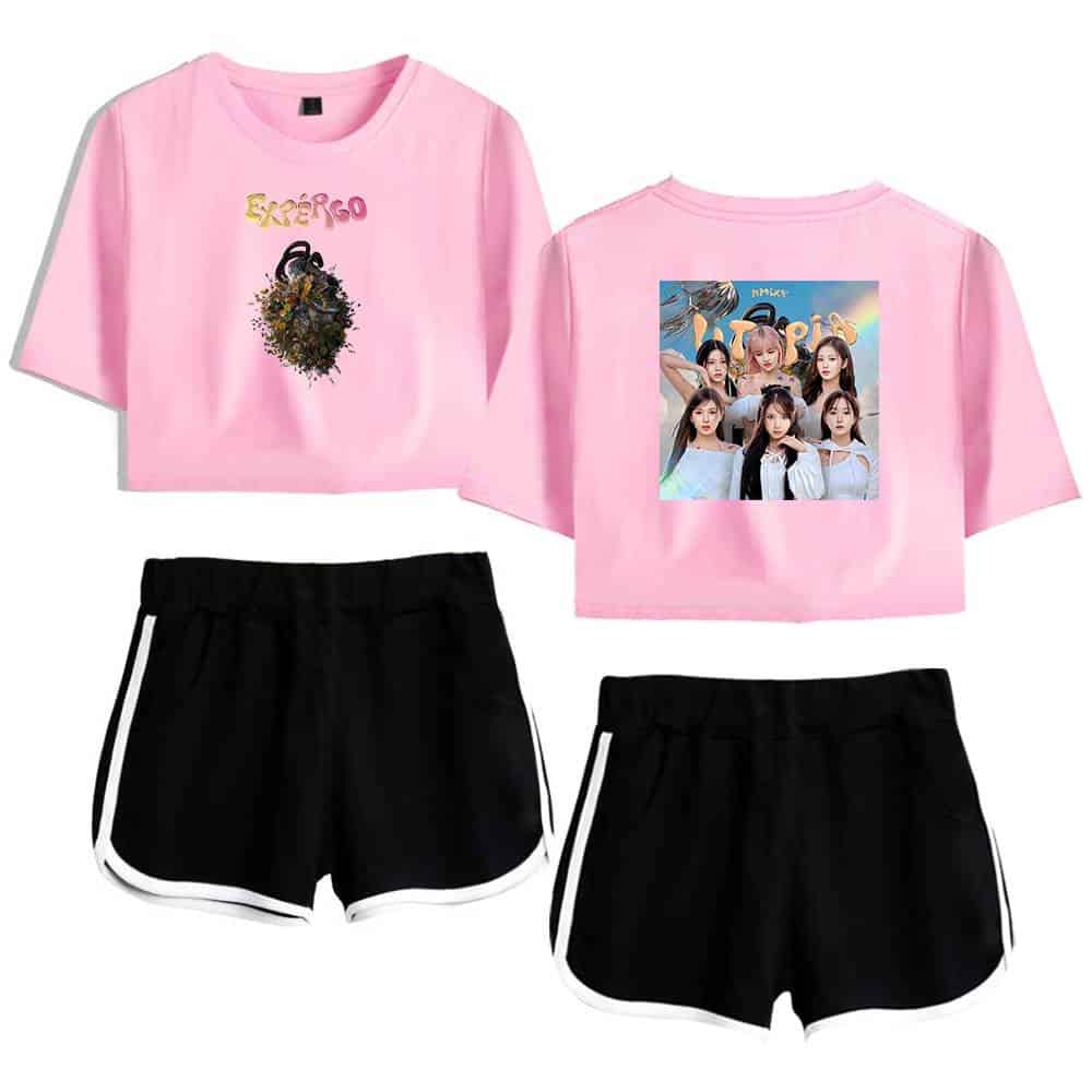 Pink Justin Bieber swag merchandise crop top with graphic print, featuring a girl group photo on the back, paired with black athletic shorts with white trim, perfect for fans of Justin Bieber fashion.
