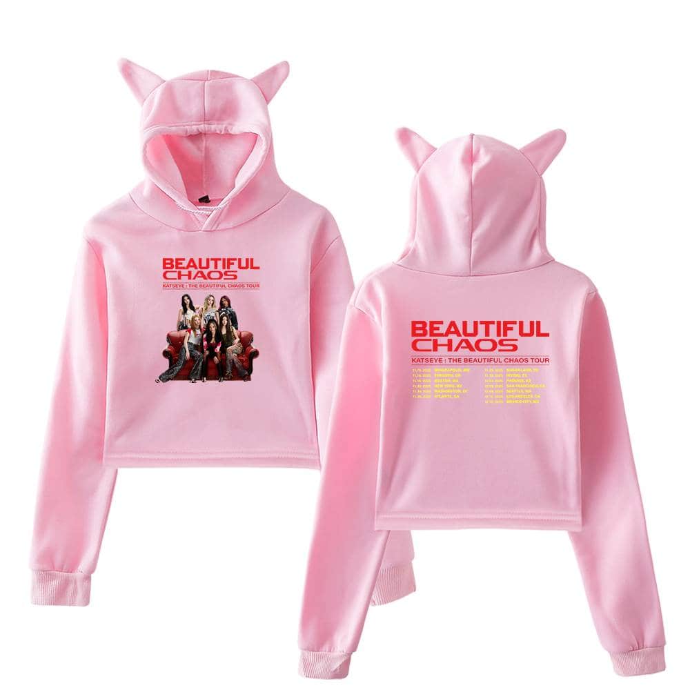 Pink hooded sweatshirt with cat ears featuring the "Beautiful Chaos" tour design and a group photo of artists.