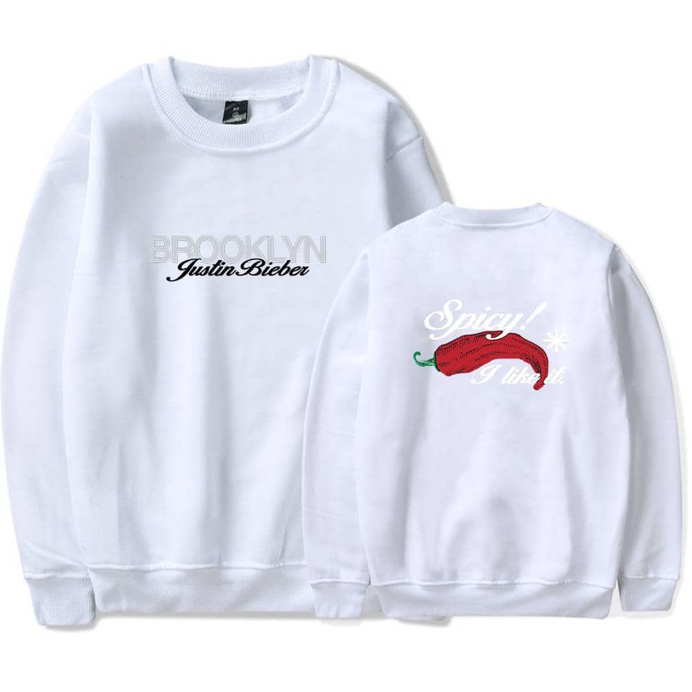 Cream sweatshirt featuring Justin Bieber's name and Brooklyn branding, perfect for fans looking for swag merch.