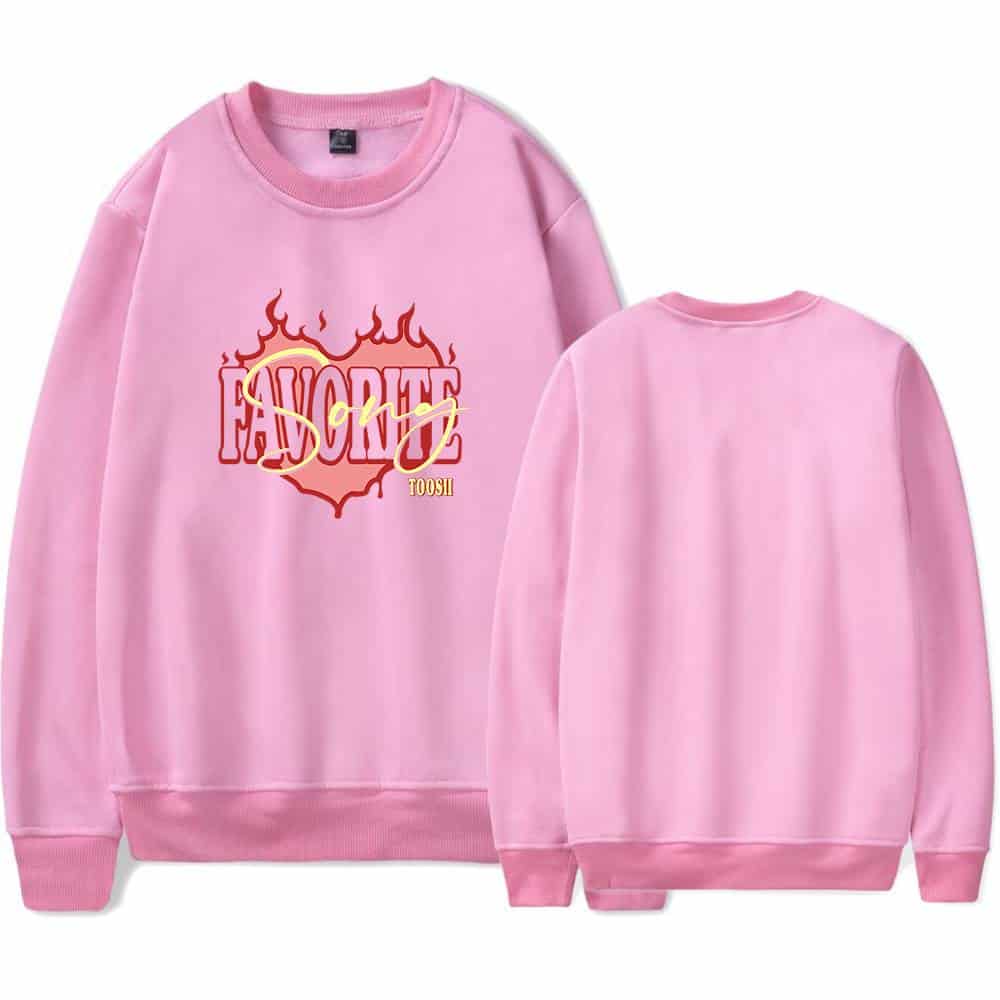Fashionable pink sweatshirt featuring Justin Bieber swag-inspired graphics, bold lettering, and flames, perfect for casual streetwear looks.