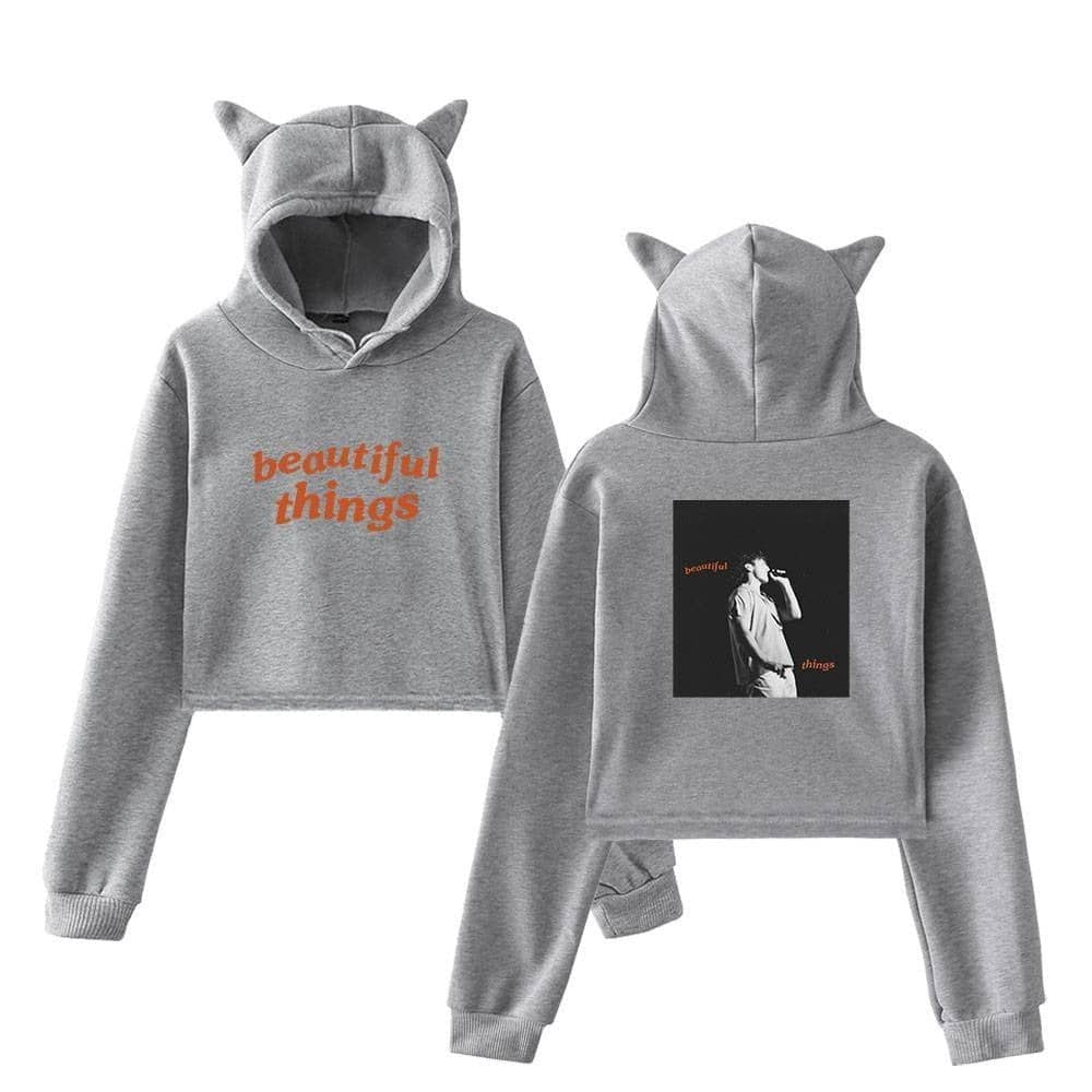 Hoodie with cat ears and "beautiful things" slogan in orange, matching sweatpants, casual streetwear style, trendy Justin Bieber swag merch.