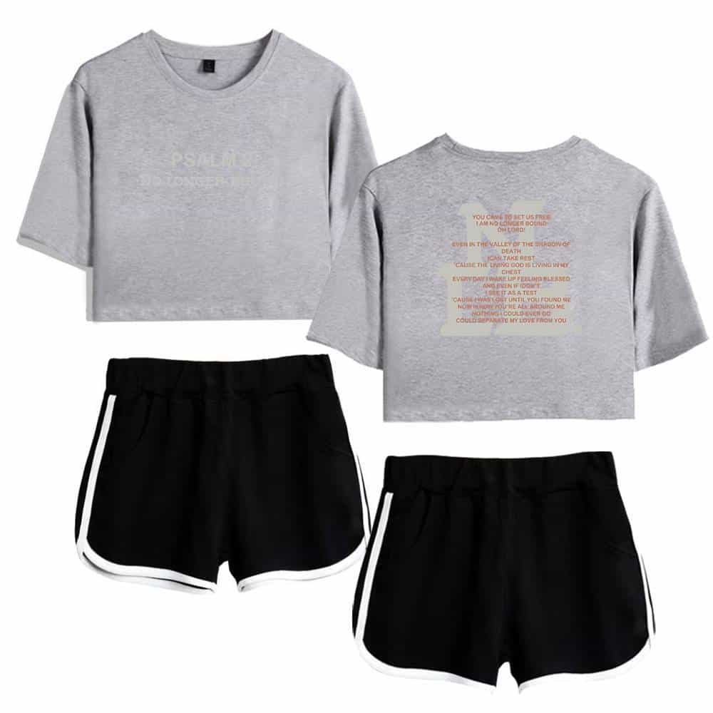 Gray cropped sweatshirt with text, casual black shorts with white trim, stylish Justin Bieber swag merch for fans.