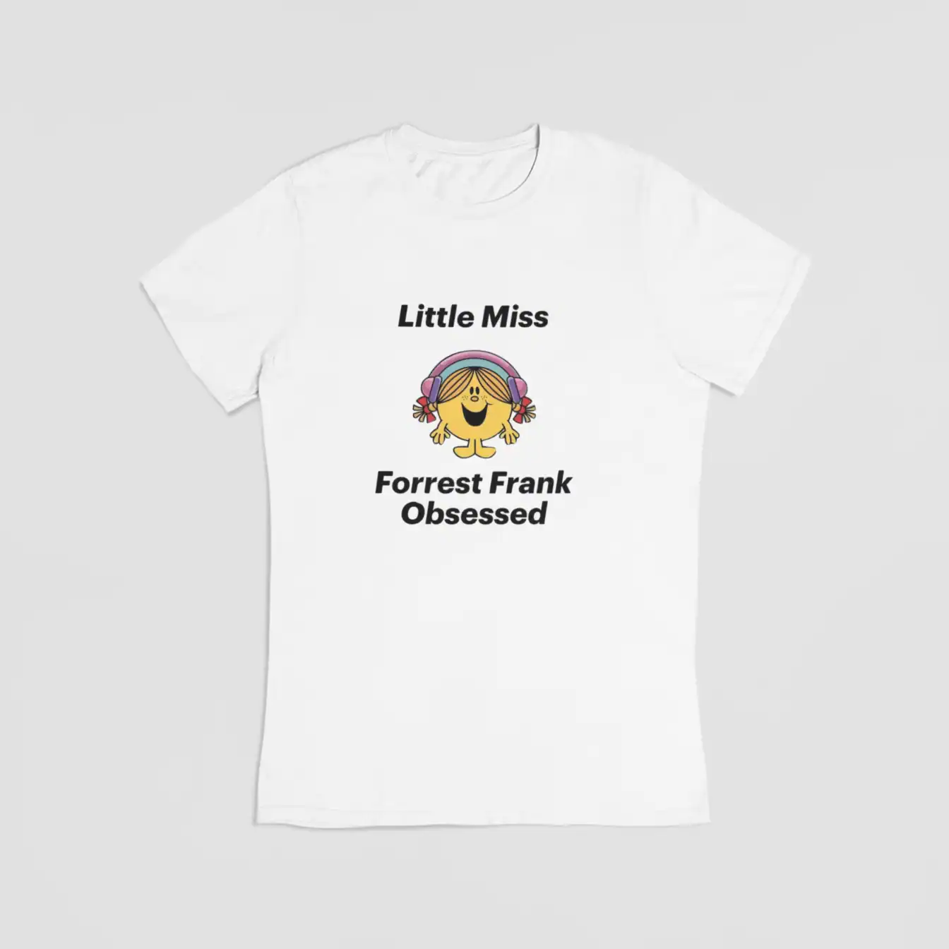 Bright white T-shirt featuring a colorful cartoon graphic of Little Miss and bold black text reading "Justin Bieber Swag Merch" in a playful, trendy style. Perfect for fans wanting stylish Justin Bieber-inspired streetwear.